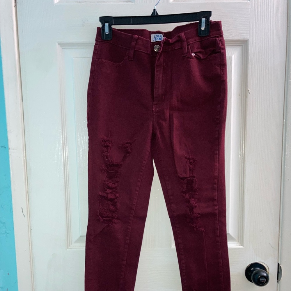 burgundy ripped jeans